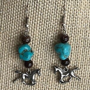 Southwestern style dangle earrings with horse charms
